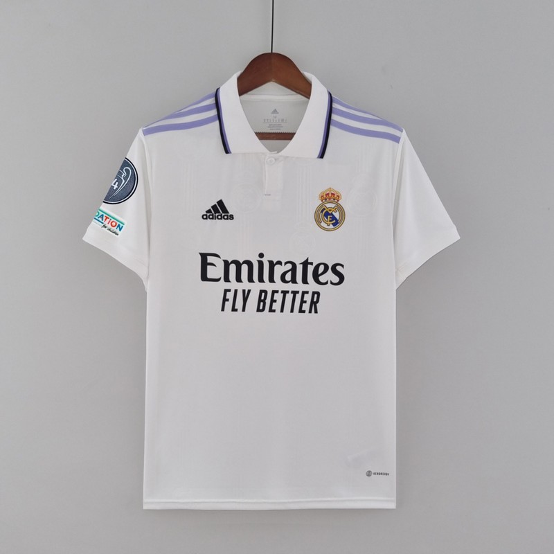 Images/Blog/4XQrks6A-เสื้อบอล เรอัล มาดริด รีลมาดริด ทีมเหย้า สีขาว Full Option Champion UEFA REAL MADRID HOME SHIRT 2022-2023 - SCC SPORTS.jpg