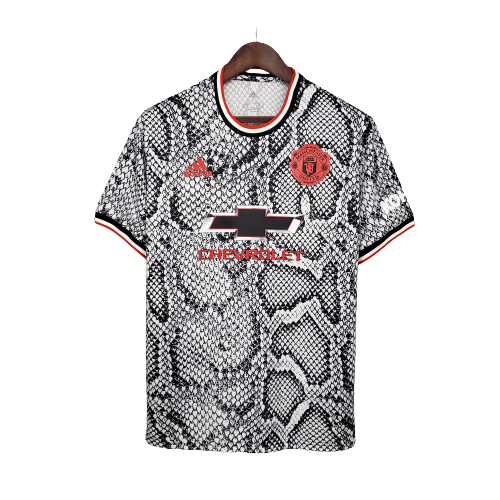 Images/Blog/UYpmAwn7-เสื้อบอล แมนยู ลายงู Manchester United Snake Edition 2021 (1).png